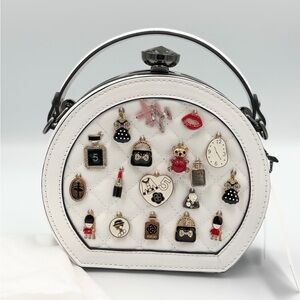 Chic White Designer Handbag with Charms